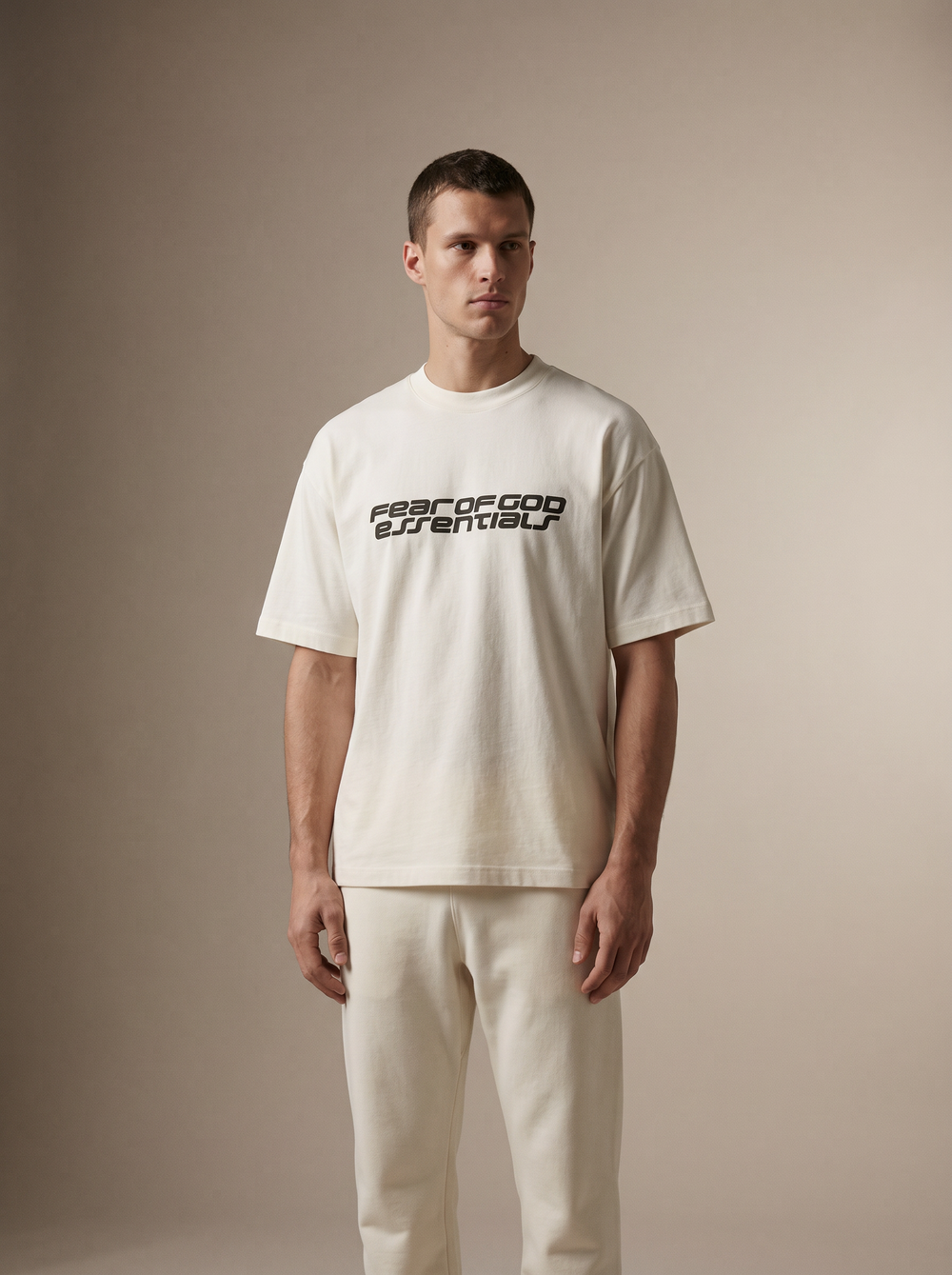 Essentials 90s Tee Ivory — on model