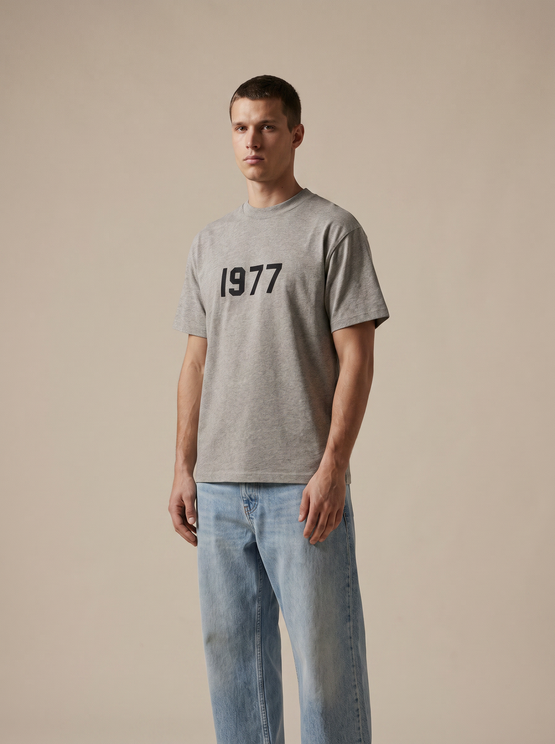 Essentials 1977 Tee Dark Oatmeal — on model