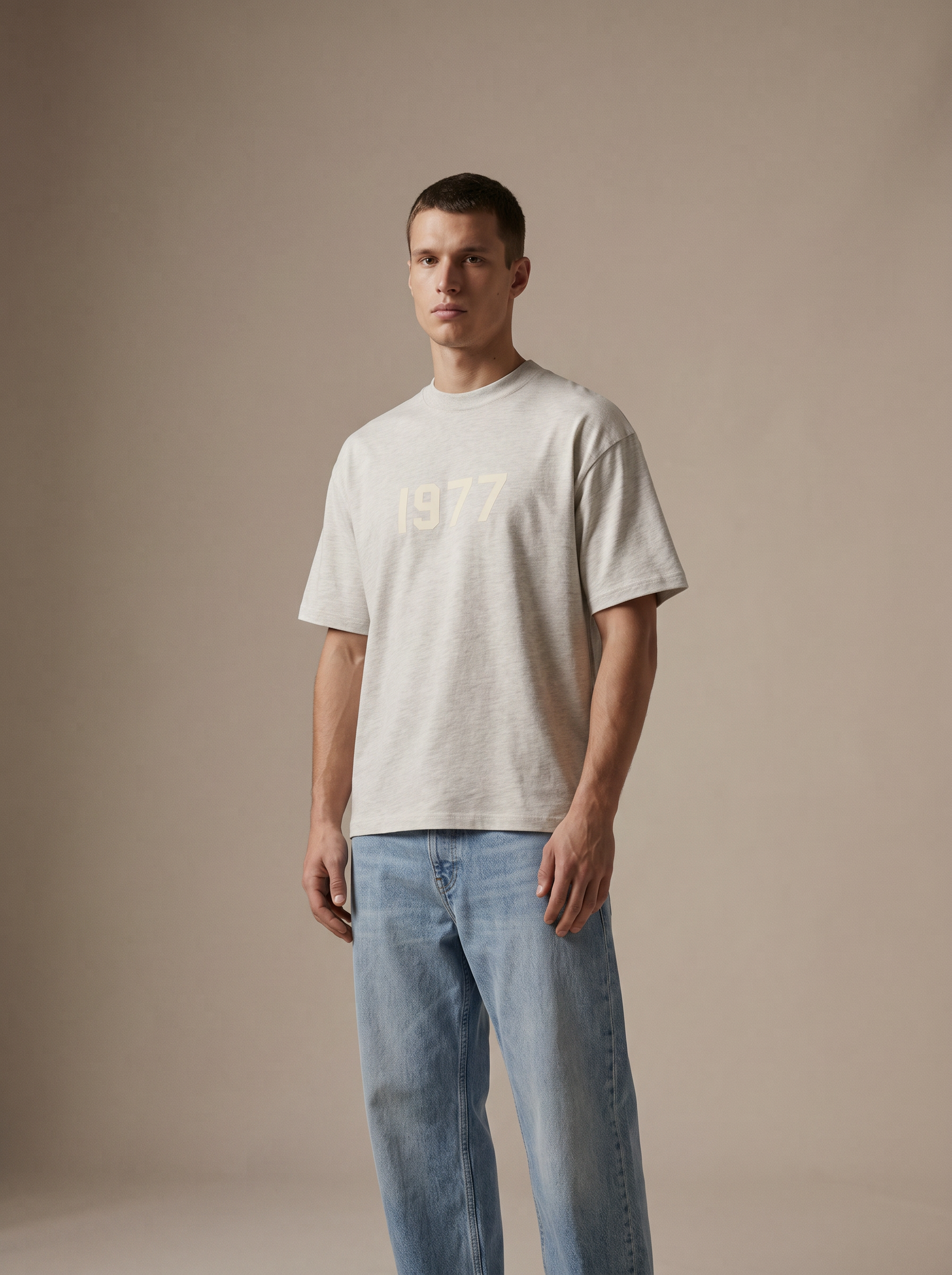 Essentials 1977 Tee Light Oatmeal — on model