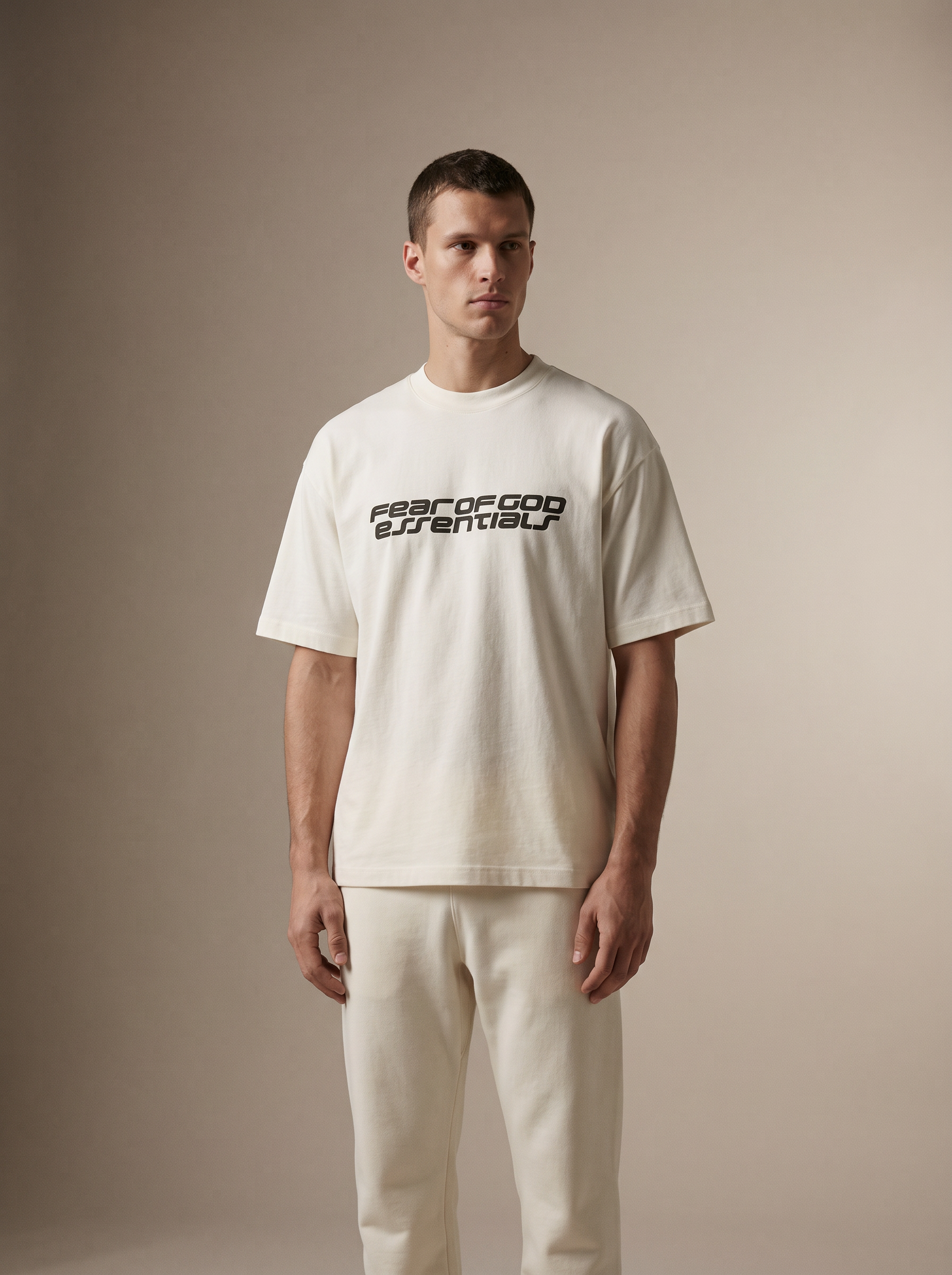 Essentials 90s Tee Ivory — on model