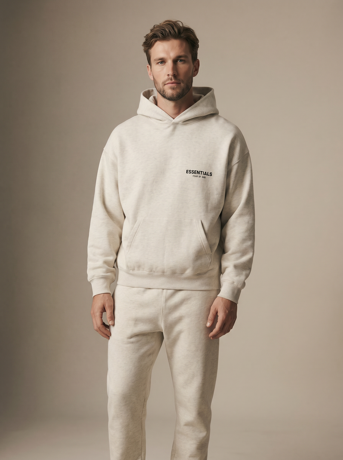 Essentials Hoodie Light Oatmeal — on model